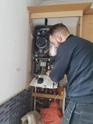Engineer performing thorough boiler service